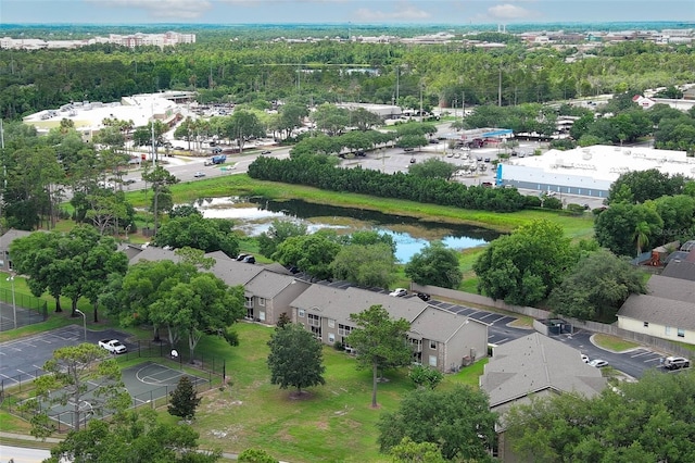 birds eye view of property with a water view and a residential view