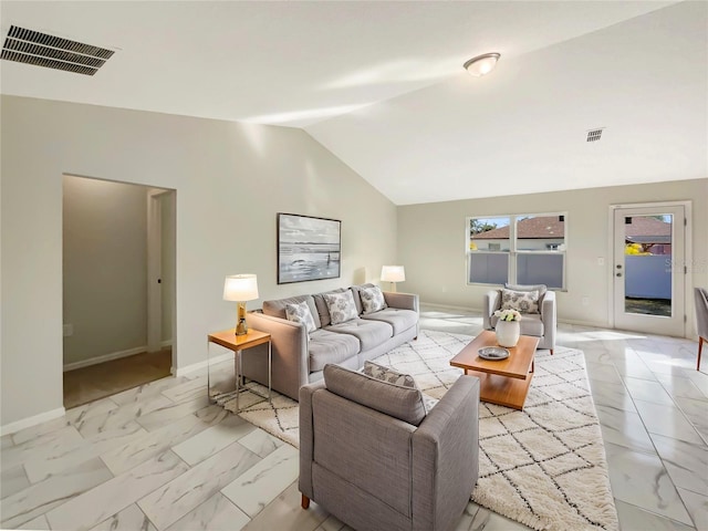 living room with lofted ceiling, marble finish floor, visible vents, and baseboards