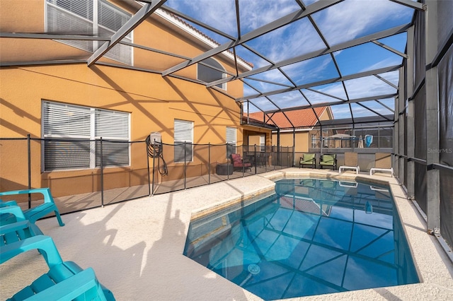 pool with a patio and a lanai