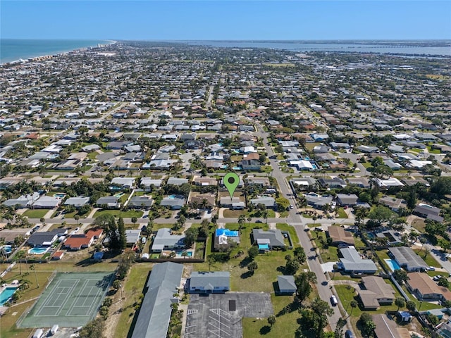 aerial view featuring a water view and a residential view