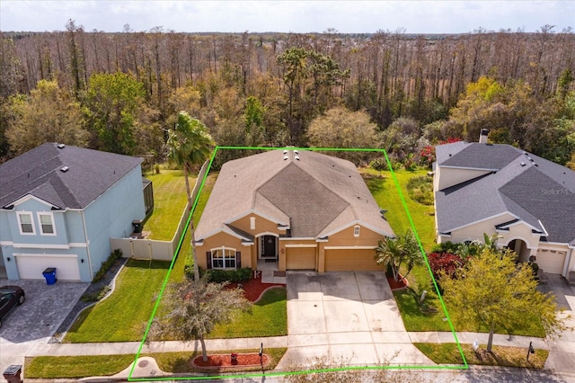 aerial view with a wooded view