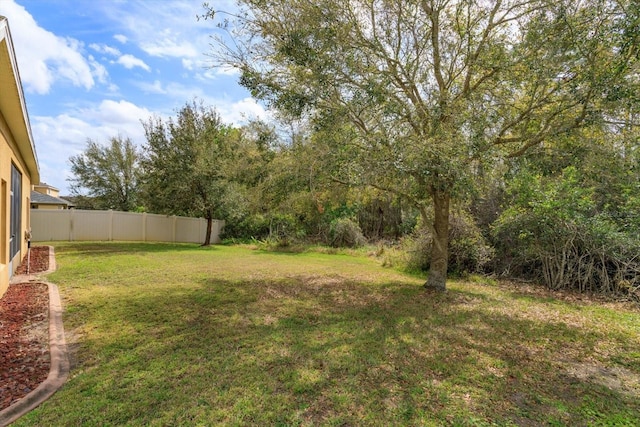 view of yard featuring fence