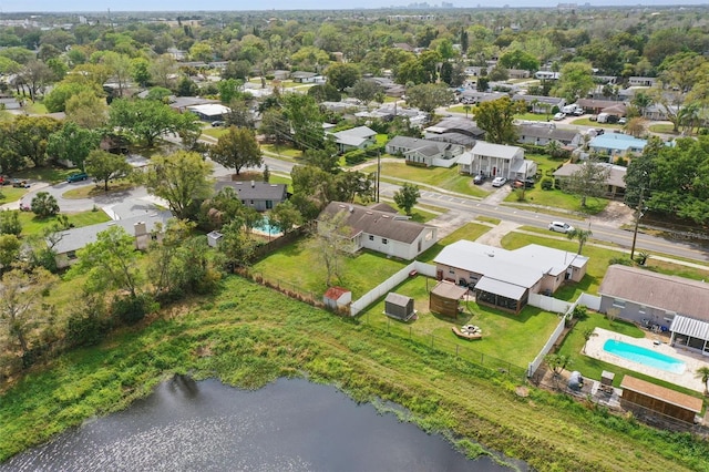 bird's eye view featuring a residential view and a water view