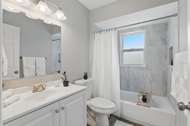 full bathroom featuring vanity, toilet, and shower / bath combo