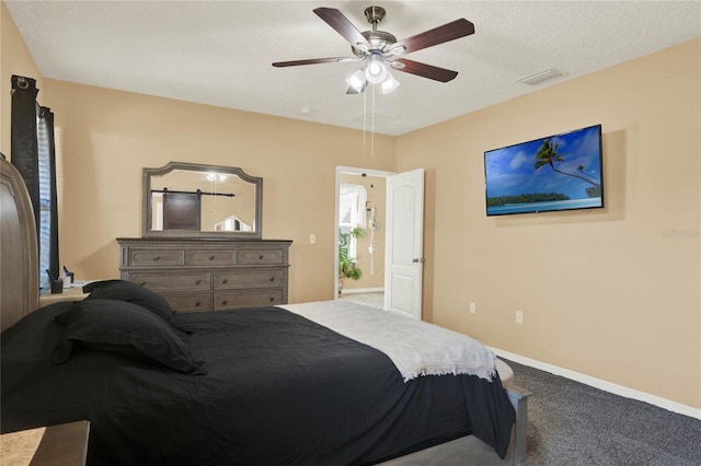 bedroom with carpet floors, baseboards, visible vents, and ceiling fan