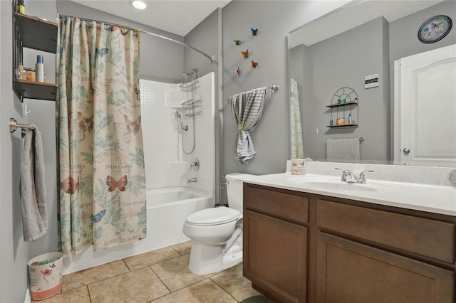 bathroom with shower / bath combination with curtain, toilet, vanity, a textured ceiling, and tile patterned flooring