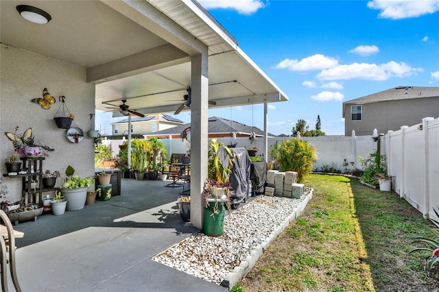 view of patio / terrace with ceiling fan and a fenced backyard