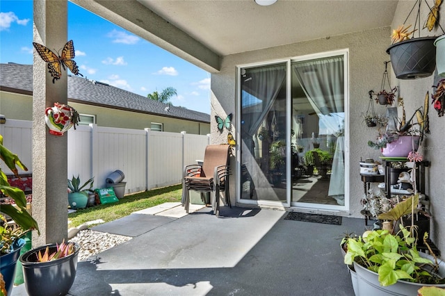 view of patio / terrace with fence