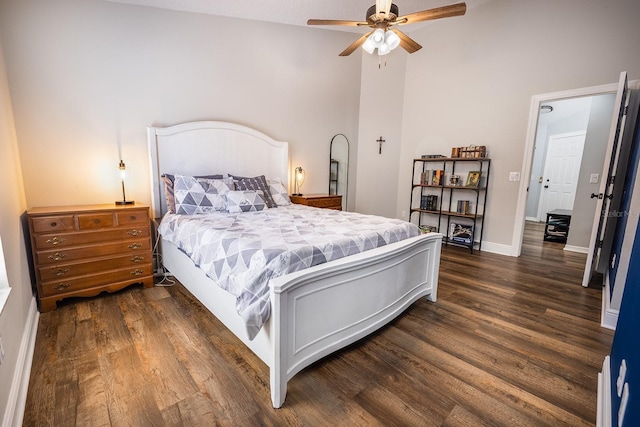 bedroom featuring dark wood-style flooring, ceiling fan, and baseboards