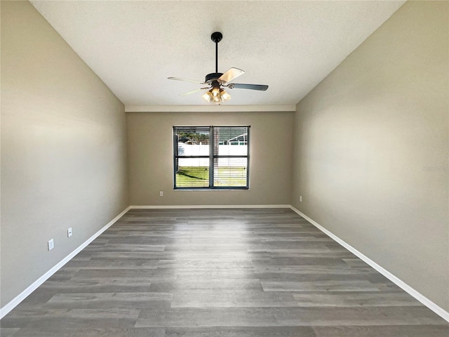 unfurnished room featuring ceiling fan, a textured ceiling, baseboards, and wood finished floors