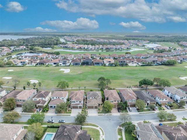 aerial view featuring golf course view and a residential view