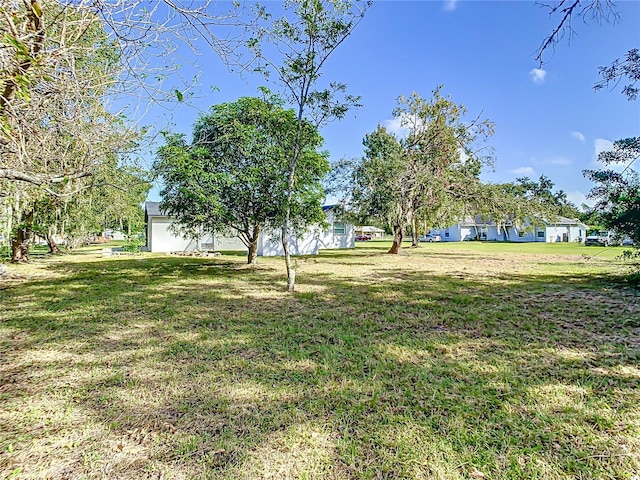 view of yard featuring a garage