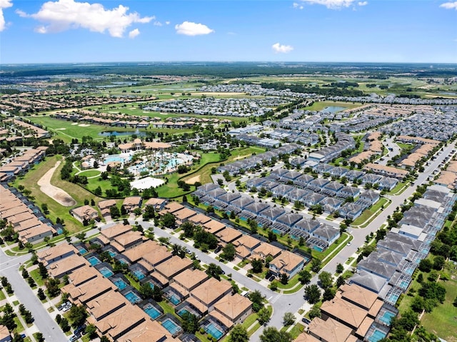 aerial view featuring a water view and a residential view