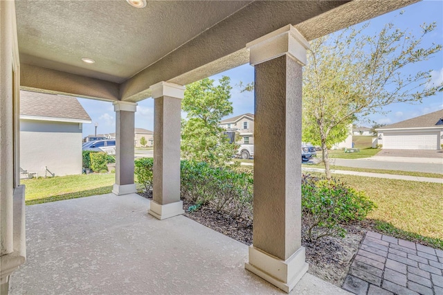 view of patio with a residential view