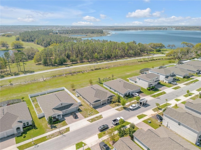 aerial view featuring a water view and a residential view