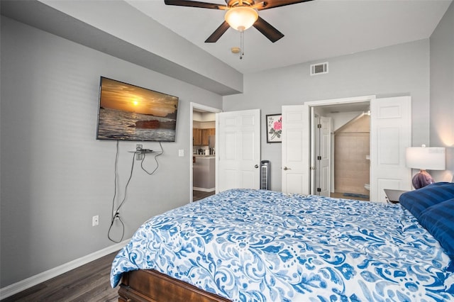 bedroom featuring dark wood-type flooring, visible vents, baseboards, and a ceiling fan