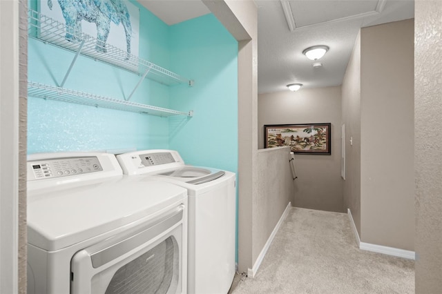 laundry room featuring baseboards, separate washer and dryer, a textured ceiling, and light colored carpet