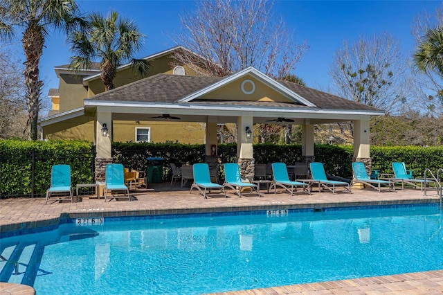 pool featuring a ceiling fan, fence, a patio, and a gazebo