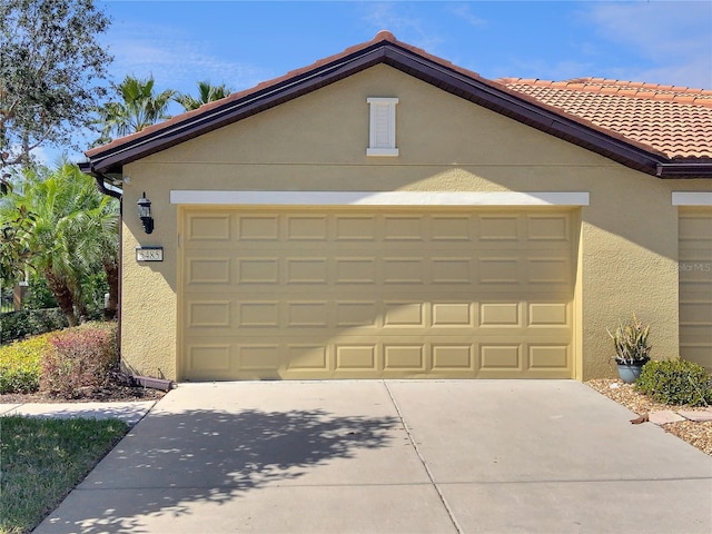 garage with driveway