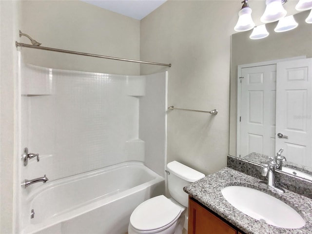 bathroom featuring vanity, toilet, and shower / bathtub combination