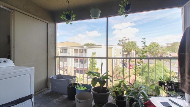 balcony with washer / dryer