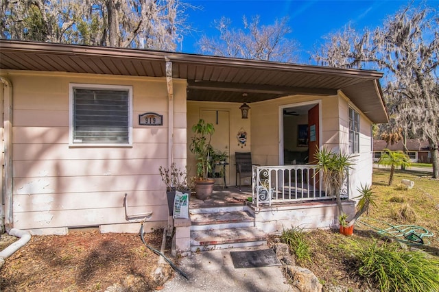 entrance to property with covered porch