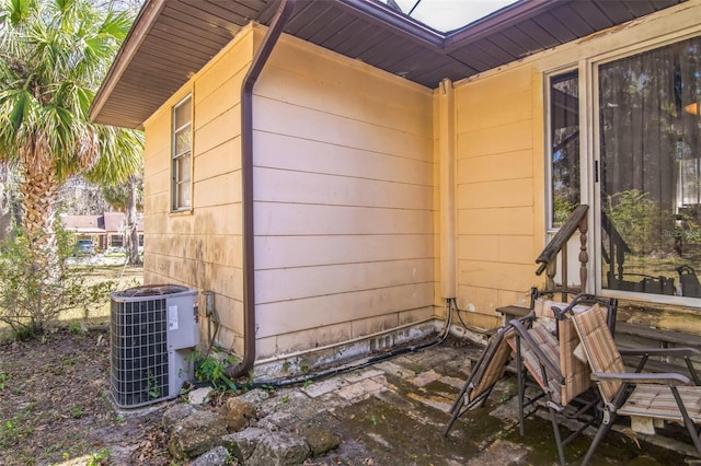 view of side of property featuring cooling unit