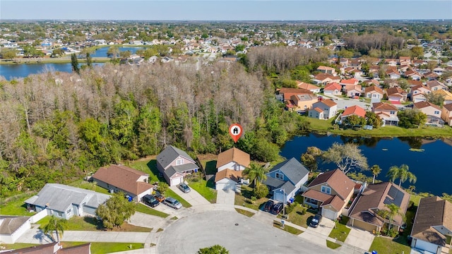 aerial view with a residential view and a water view