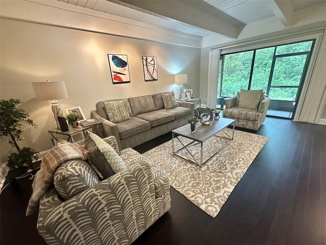 living room featuring beam ceiling and wood finished floors