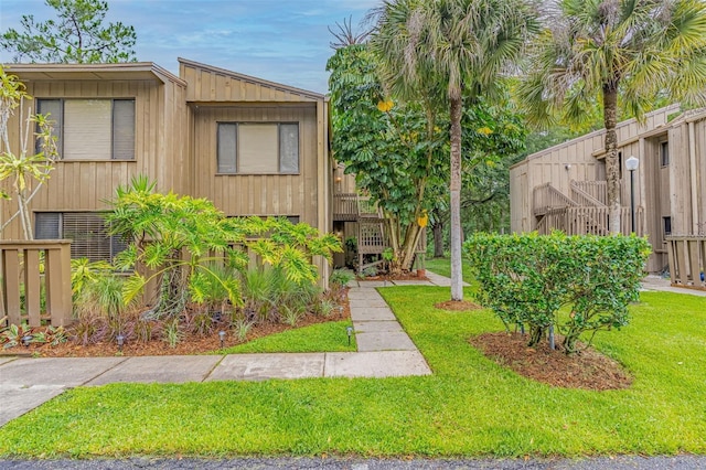 5337 Indian Creek Dr Unit C-4-1, Orlando, FL 32811 - view of property with a front yard