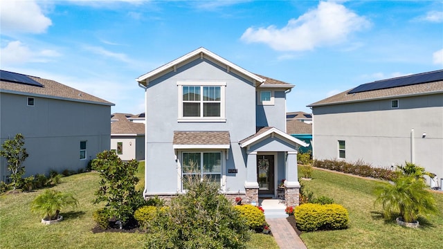 9747 Petition Way, Orlando, FL 32832 - view of front of home with stucco siding and a front lawn