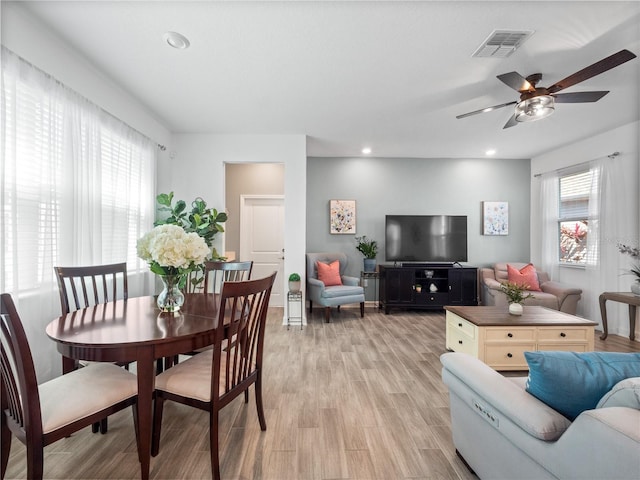9747 Petition Way, Orlando, FL 32832 - dining space featuring visible vents, light wood-type flooring, recessed lighting, and a ceiling fan