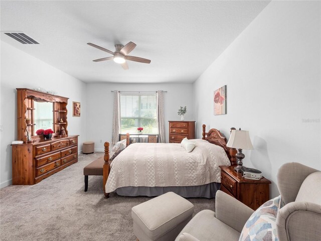 9747 Petition Way, Orlando, FL 32832 - carpeted bedroom featuring baseboards, a ceiling fan, and visible vents