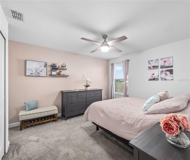 9747 Petition Way, Orlando, FL 32832 - bedroom with a ceiling fan, baseboards, carpet, and visible vents