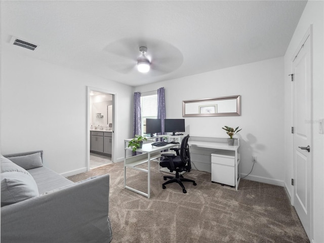 9747 Petition Way, Orlando, FL 32832 - carpeted office space featuring visible vents, baseboards, and a ceiling fan