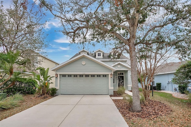 view of front of house with driveway and an attached garage