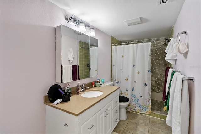 1489 Magellan Cir Unit 603, Orlando, FL 32818 - bathroom with toilet, vanity, tile patterned floors, and a shower stall