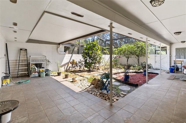 1489 Magellan Cir Unit 603, Orlando, FL 32818 - view of patio featuring a lanai and fence