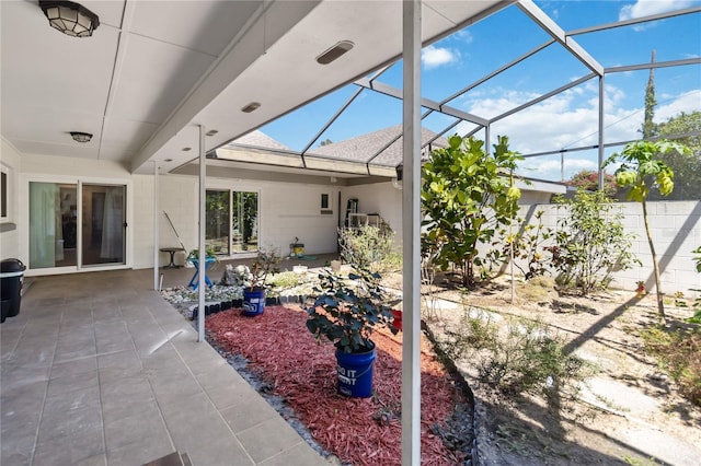 1489 Magellan Cir Unit 603, Orlando, FL 32818 - view of patio / terrace with glass enclosure and fence