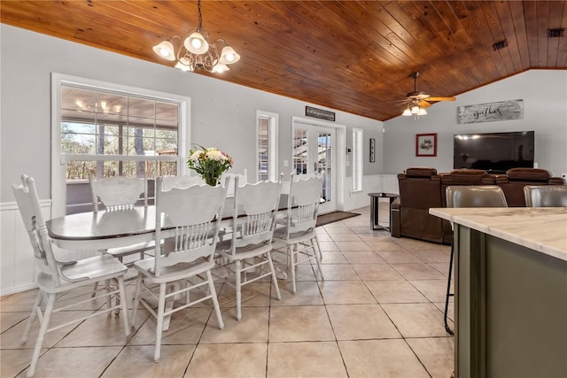 dining area with visible vents, wood ceiling, light tile patterned flooring, vaulted ceiling, and ceiling fan with notable chandelier