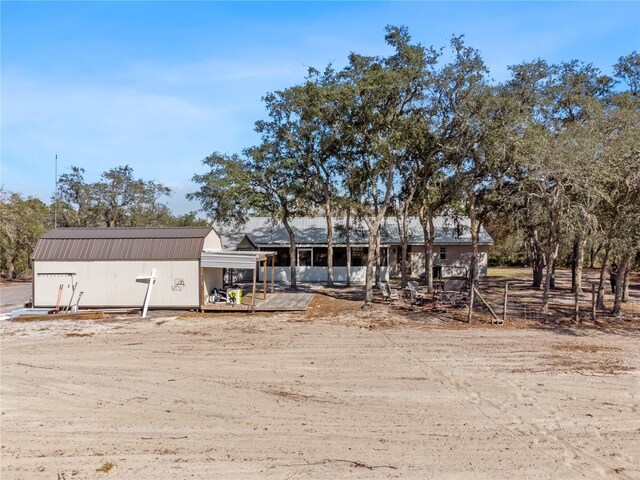 view of front of house with metal roof