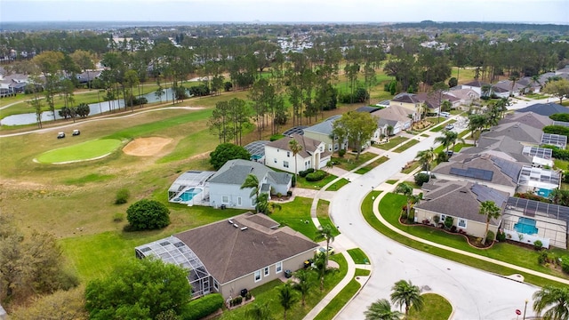 aerial view with view of golf course and a residential view