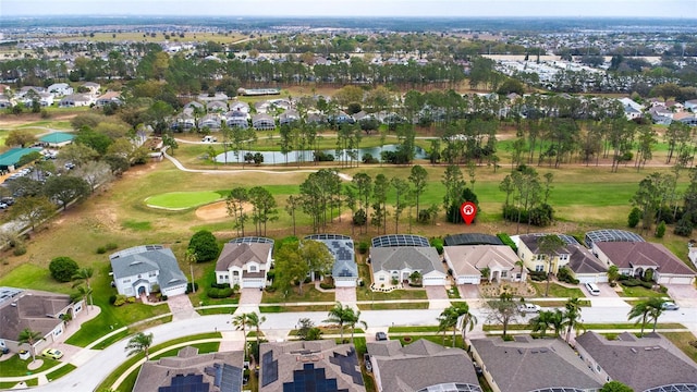 birds eye view of property with a residential view and golf course view