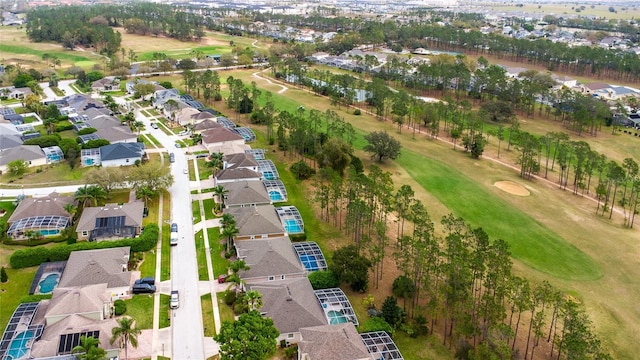 aerial view featuring golf course view and a residential view