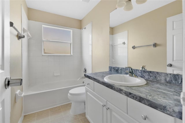 bathroom featuring visible vents, toilet, tile patterned floors, vanity, and shower / bathing tub combination