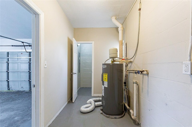 utility room featuring electric water heater