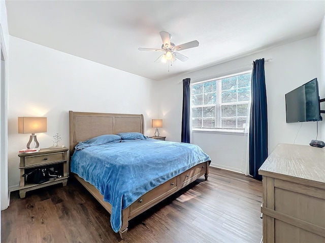 bedroom featuring wood finished floors and a ceiling fan