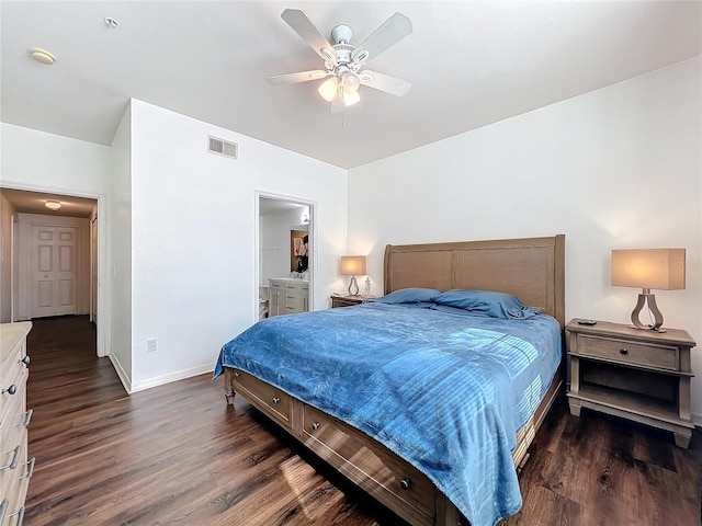 bedroom featuring baseboards, visible vents, connected bathroom, ceiling fan, and dark wood-type flooring