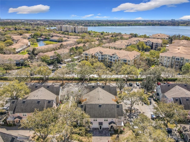 bird's eye view with a water view and a residential view