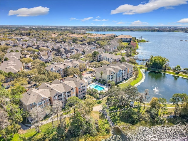 birds eye view of property with a residential view and a water view